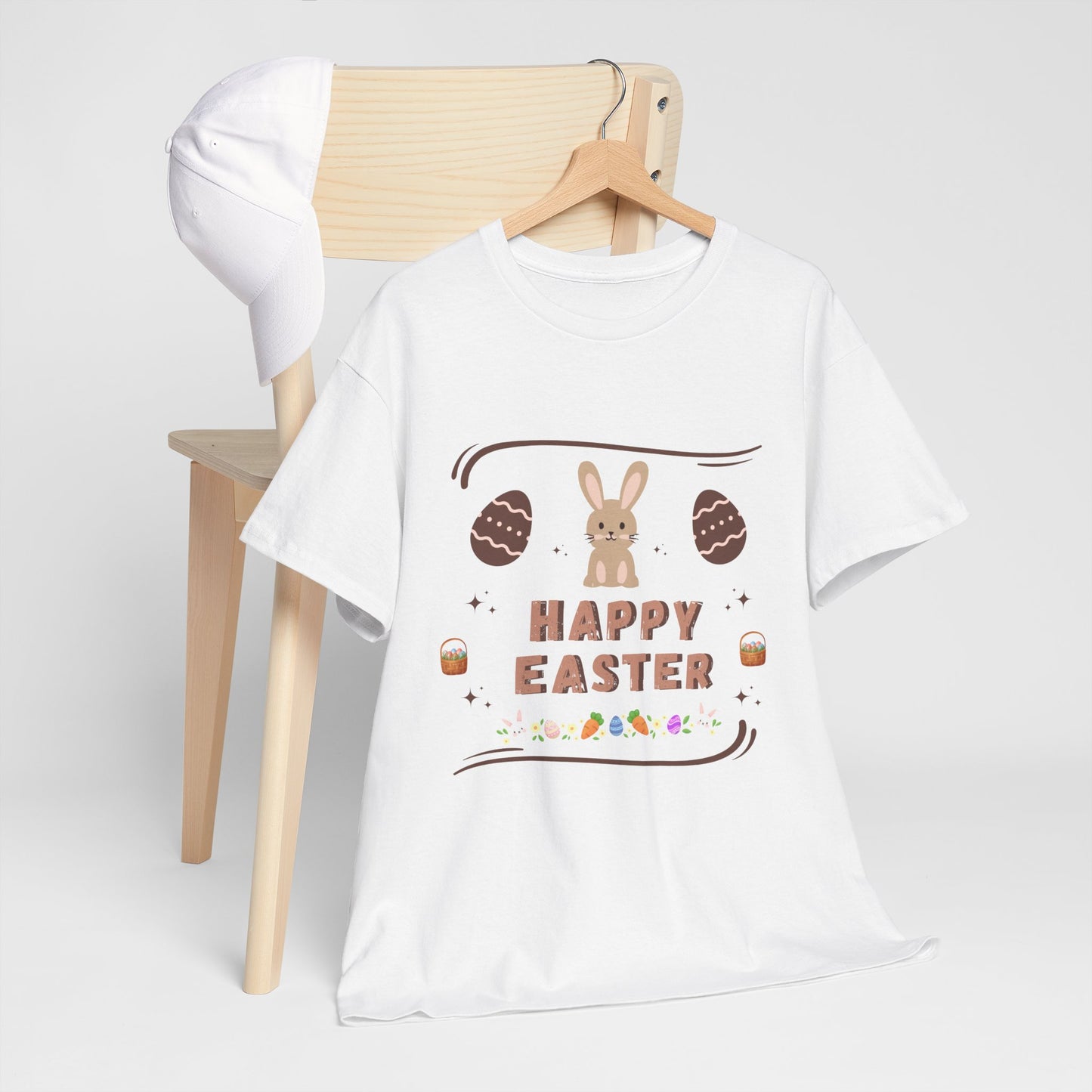 White cute bunny Easter tee with Easter eggs and happy Easter text hanging on chair with white cap