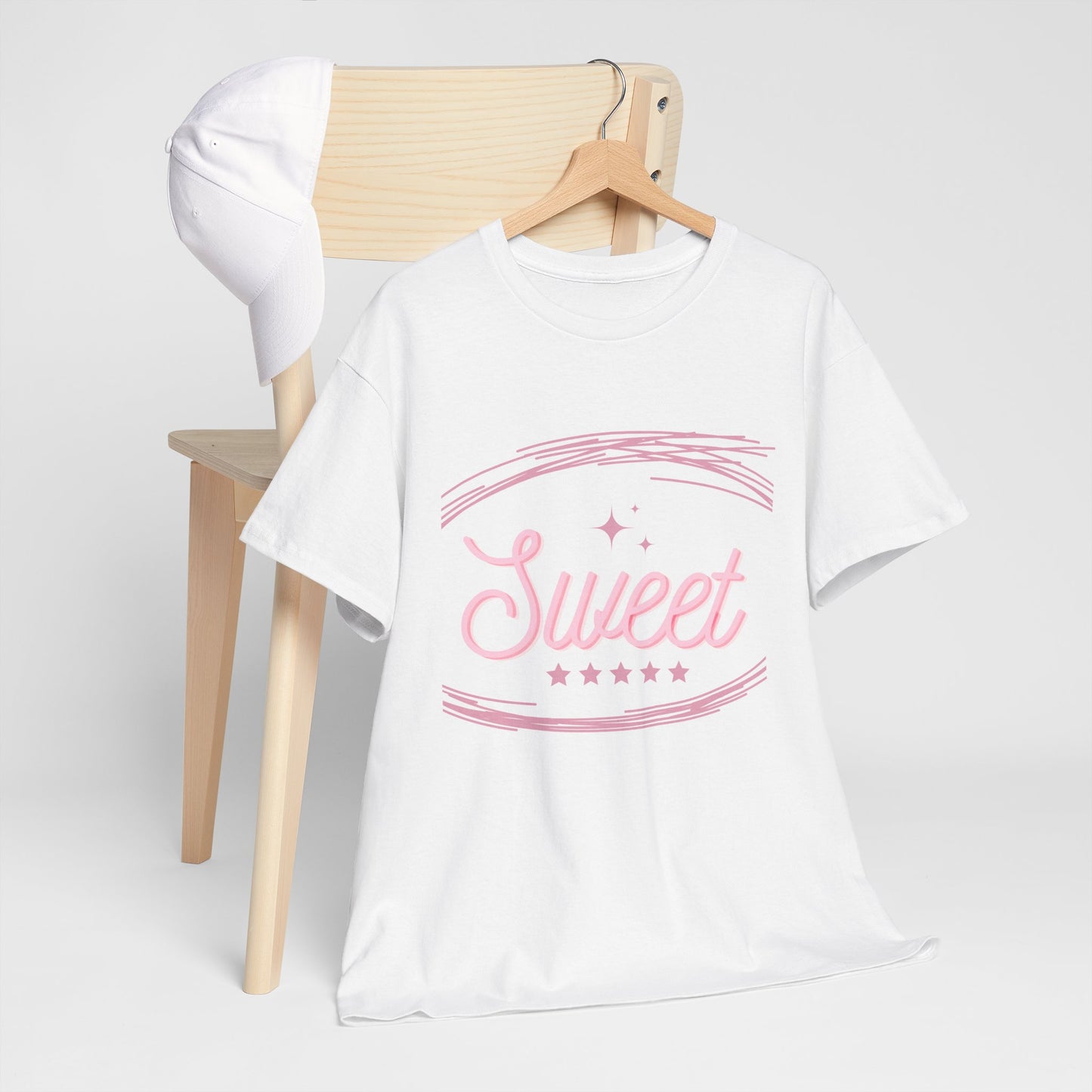 White T-shirt with pink Sweet graphic design cute party shirt for adults displayed on hanger